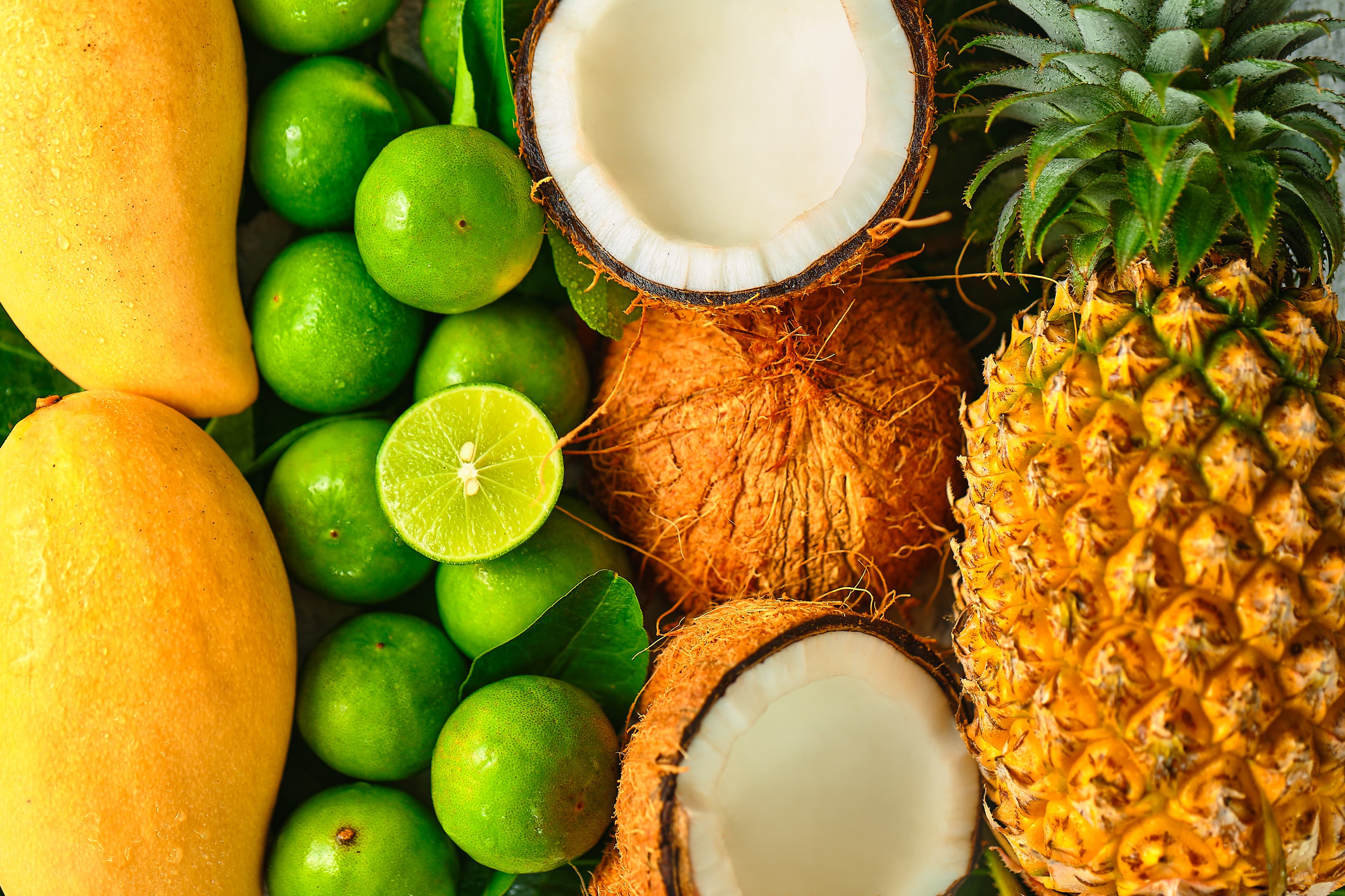 Coconut, mango, pineapple lime fruit background